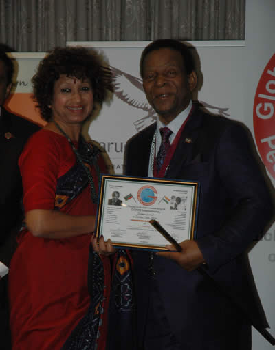 Receiving Achievement Award from the hand of the King  of the Zulu Nation King Gppdwill Zwelithini Ka Bhekuzulu.