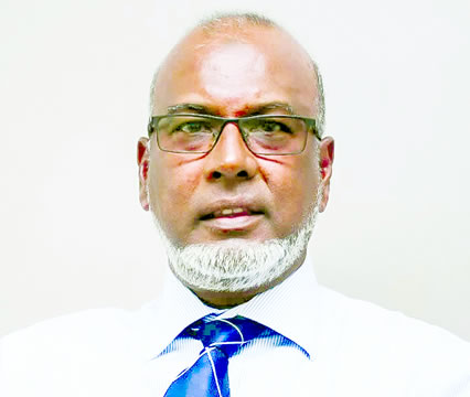 Dr Munsur Takun