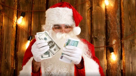 Il distribue des billets volés aux passants aux cris de Joyeux Noël
