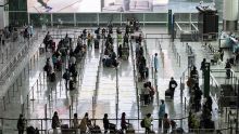 Covid-19: Hong Kong défend une suspension temporaire des vols en cas de passagers infectés