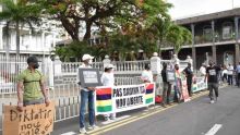 Amendements à l'IBA Act : manifestation symbolique devant le Parlement