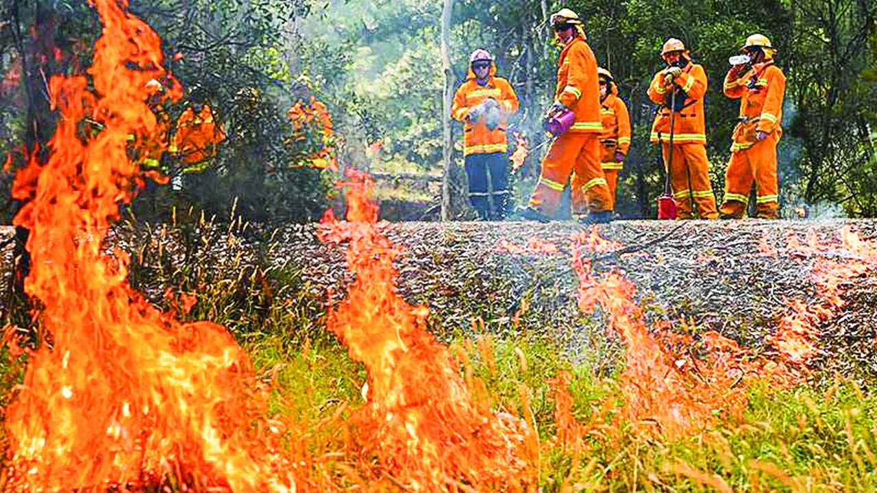 Australians are being urged to evacuate as giant fires threaten to regenerate with high winds  and hot temperatures.